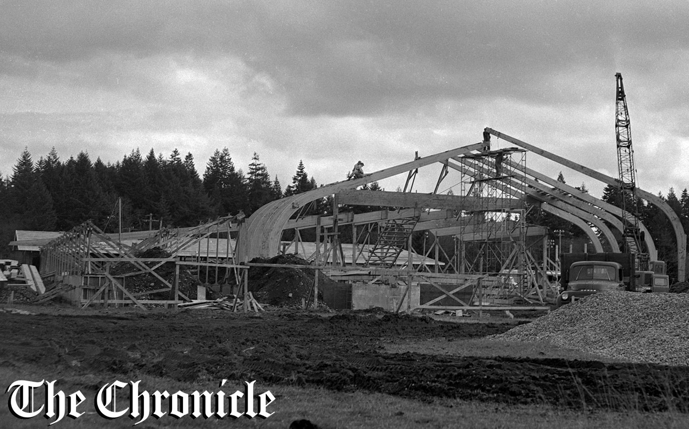 From the February 1958 Chronicle archives: “JUNIOR HIGH TAKES SHAPE - Centralia’s new 750-student junior high school is taking shape on its site near Fort Borst park. This first, overall view shows massive wood laminated arches going up for the gymnasium. Each is 60 feet long and weighs 1,800 pounds. They will span 100-foot arch. The million-dollar plant is right at construction schedule, according to contractors, and currently has some 40 men busy. Buildings’ cost is $952,000, and next week school directors will open bids on the school center’s furnishings, to cost from $60,000 to $75,000. New junior high is to be ready for start of 1958-59 school year. - Chronicle Staff Photo.”